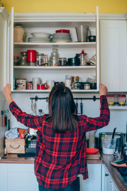 istock Housewife organizing the kitchen. 1252716486
