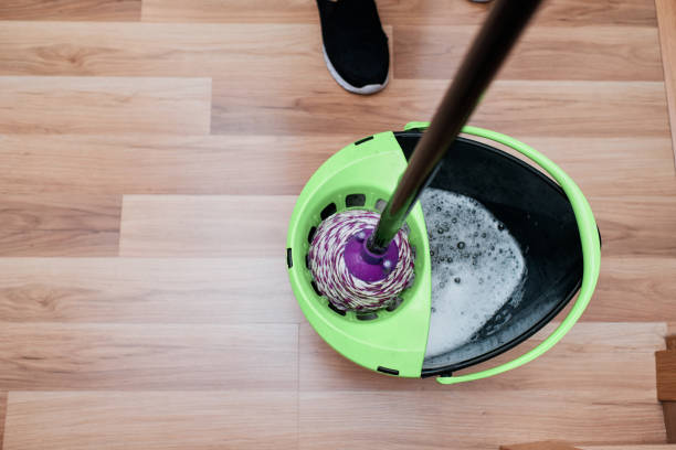 istock closeup of mop cleaning floor 1252717149