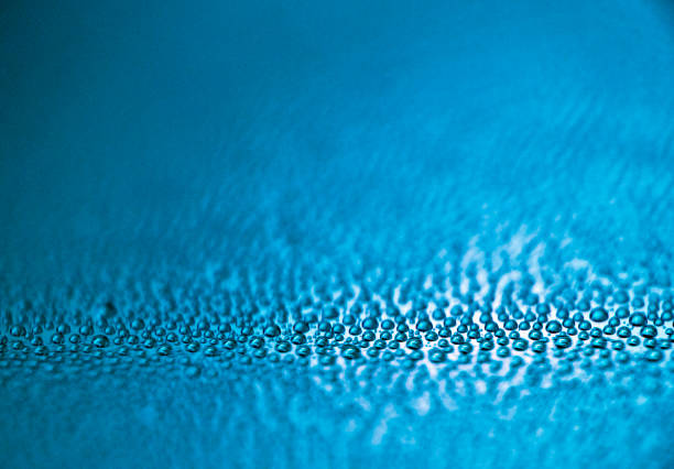 Small blue bubbles floating with shallow dof