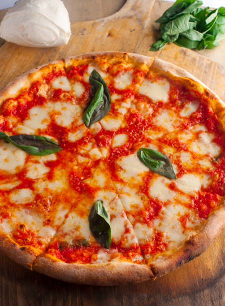 Pizza. Homemade dough topped with marinara sauce, mozzarella cheese, sausage, pepperoni, bell peppers, onions and mushrooms. Classic Italian entree.