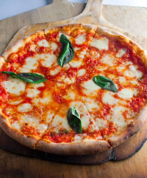 Pizza. Homemade dough topped with marinara sauce, mozzarella cheese, sausage, pepperoni, bell peppers, onions and mushrooms. Classic Italian entree.