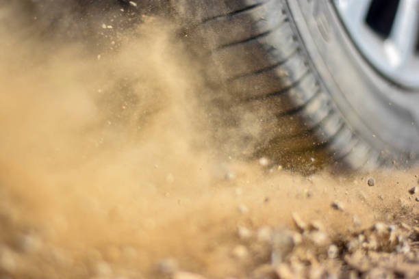 istock The car tire slips on a macadam surface - close-up photography 1252721939