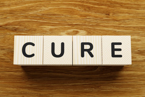 istock CURE word on a wooden blocks. 1252721987