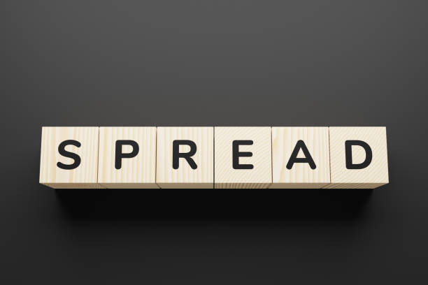 istock SPREAD word on a wooden blocks. 1252722064