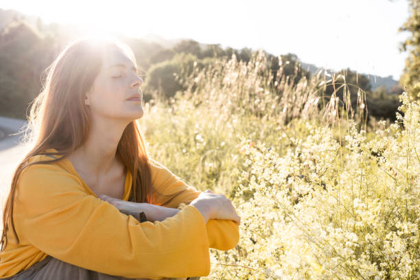 istock woman in nature sunspots 1252724595