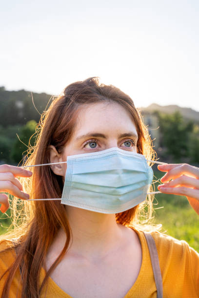 istock woman with a mask 1252724623