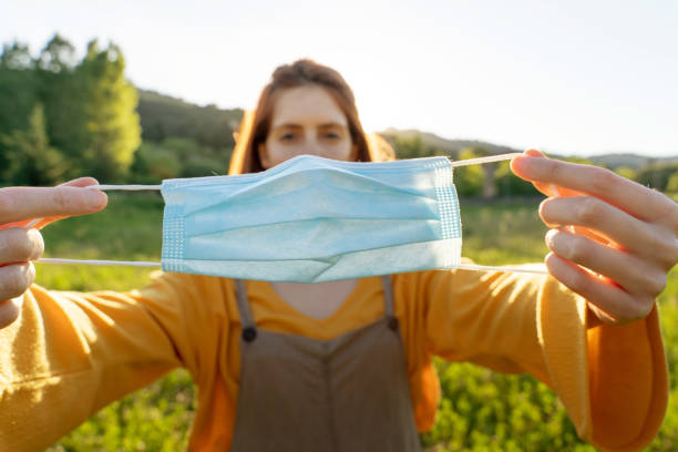 istock woman with a mask 1252724631