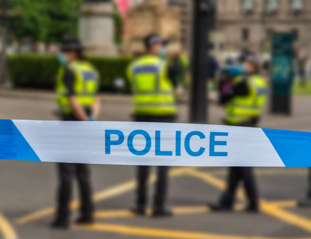 Glasgow Police At An Incident Police In Glasgow During An Incident Near George Square roped off stock pictures, royalty-free photos & images