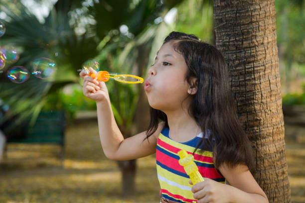 istock Girl in public park 1252728885