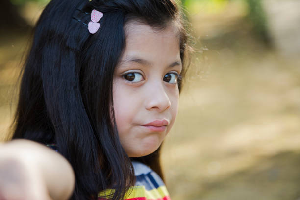 istock Girl in public park 1252734122