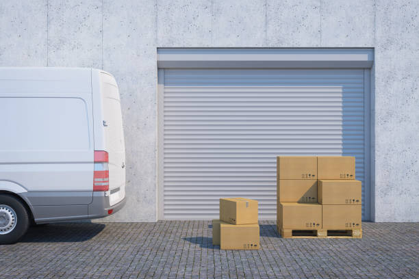 istock delivery van with a paper boxes near warehouse, 3d rendering 1252738030