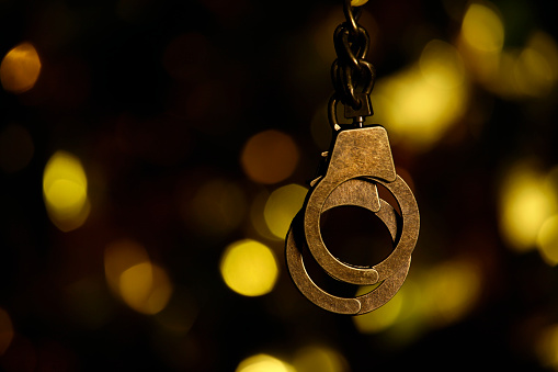 image of handcuff dark background