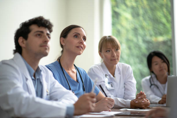istock Medical students listening attentively 1252738534
