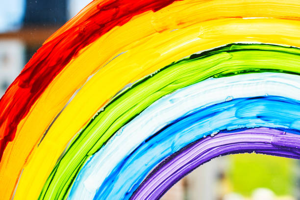 A rainbow painted on a window. Gay Colours Spectrum