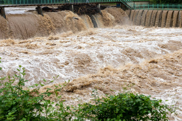 istock Flooding after storm - unglean water with soil comming 1252755036