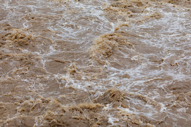 istock Flooding after storm - unglean water with soil comming 1252756108