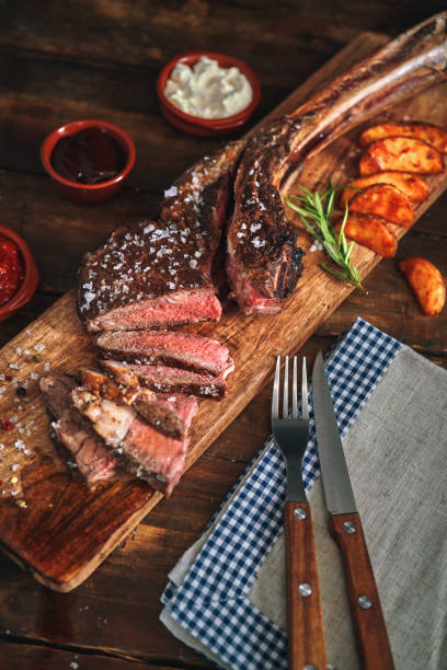 istock Tomahawk Steak with Country Potatoes 1252756314