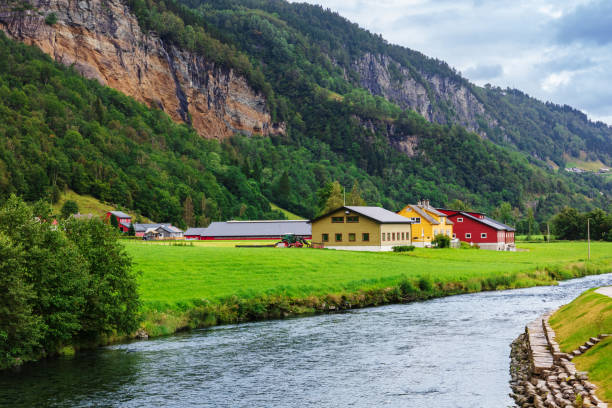 istock beautiful houses by the river, Norway 1252759069