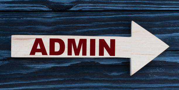 istock ADMIN word written on a wooden arrow on a beautiful dark background 1252760557