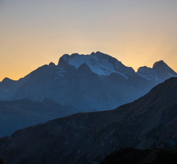 istock Mountain evening dusk peaceful hazy view from Giau Pass. 1252761710