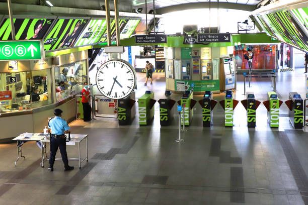 Bangkok entrance with turnstiles to the metro station. Bangkok entrance with turnstiles to the metro station. Thailand Bangkok March 2020 bts skytrain stock pictures, royalty-free photos & images