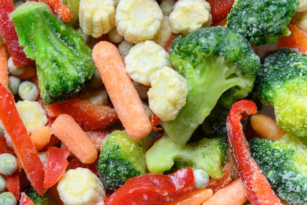 istock Frozen colorful vegetables. Abstract pattern. Food background. 1252763099