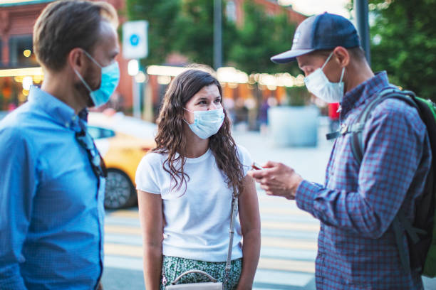 istock Friends walking together during virus epidemic 1252763169