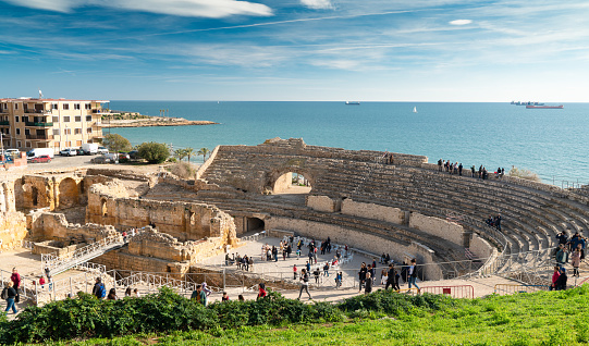 Tarragona, Spain - Decembre 02, 2018: Tarragona Amphitheatre is an Roman amphitheatre in the city of Tarraco. It was built in the 2nd century AD. The amphitheatre could house up to 15,000 spectators, and measured 130 by 102 metres (427 ft × 335 ft).