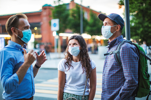 Friends walking together during virus epidemic