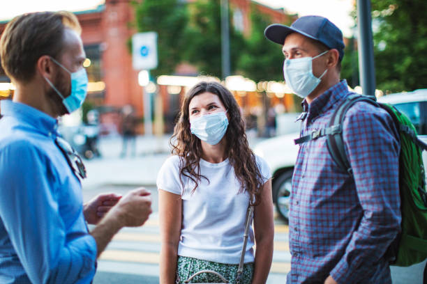 istock Friends walking together during virus epidemic 1252764192