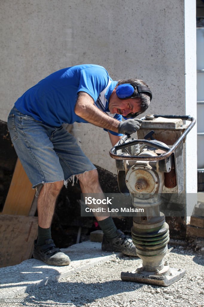 Compactor Work Construction Worker Compacting Soil Using Compactor Work With Tamping ...