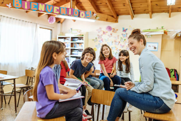 istock Teacher motivating kids to be active in classroom 1252770727