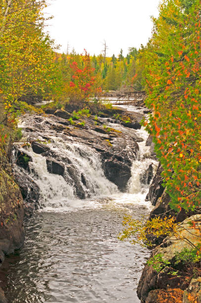 istock Hidden Waterfall in the Fall in the North Woods 1252773272