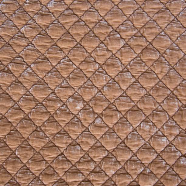 istock Rouge velvet diamond quilted fabric texture 1252780113