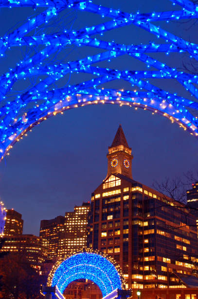 Blue Christmas lights adorn a trellis in downtown Boston The Custom House in Boston is framed by a trellis illuminated with blue lights at Christmas north end boston photos stock pictures, royalty-free photos & images