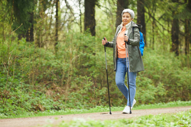istock Active Senior Woman in Forest 1252788162
