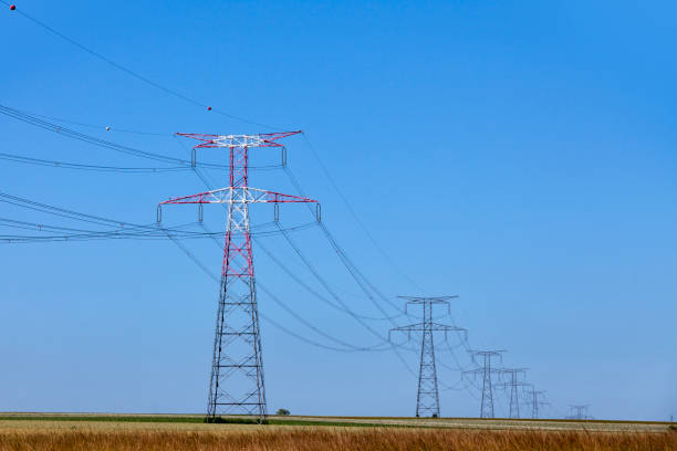 istock High voltage towers in a rural landscape 1252790360
