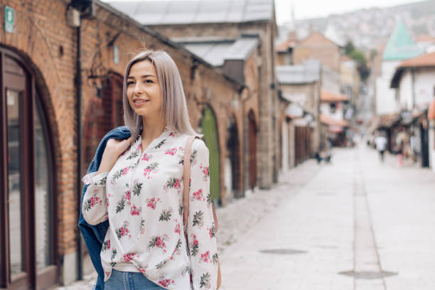 istock Young woman on vacation sightseeing 1252791217