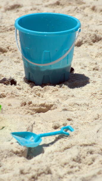 istock Plastic beach toys on the beach 1252795745