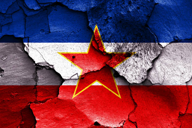 istock flag of Yugoslavia painted on cracked wall 1252801042