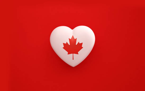 istock Heart Textured with Canadian Flag on Red Background 1252801756