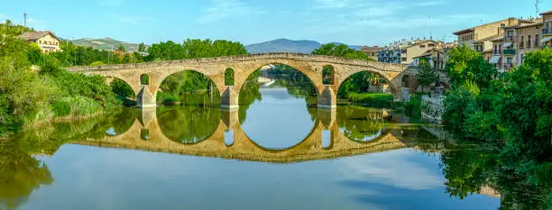 Photo of Puente de la Reina in Saint James Way bridge over Arga River in Pamplona