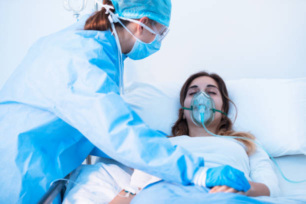 istock Nurse comforting a sick patient in the ward 1252803875