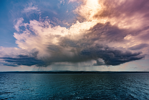 Rain thunderstorm over the sea