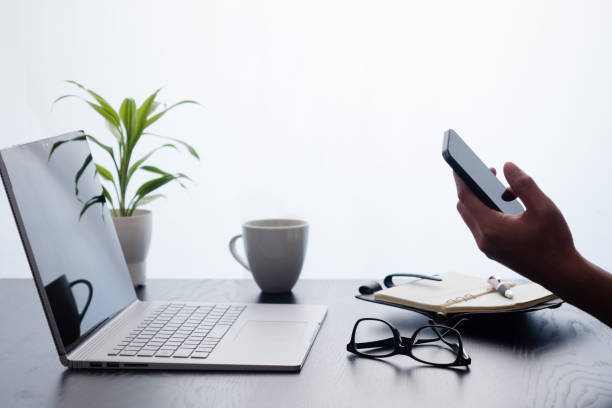 istock Japanese man at hand using a smartphone 1252809372