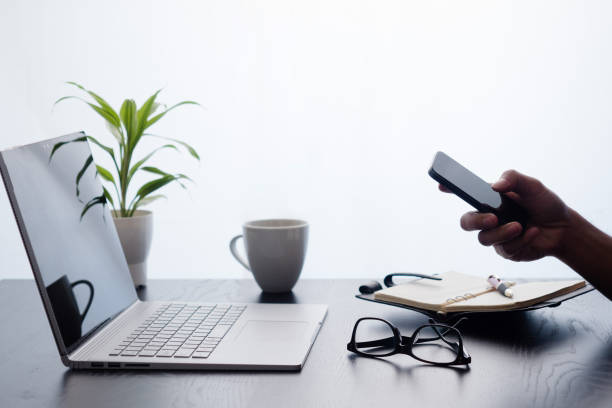 istock Japanese man at hand using a smartphone 1252809423