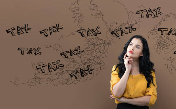 istock Tax problem theme with young businesswoman 1252809541