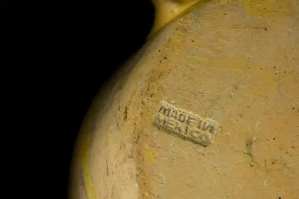 Photo of Mexican clay pots close up. Made in Mexico.