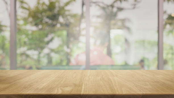 istock Empty wood table top and blurred coffee shop and restaurant interior background - can used for display or montage your products. 1252828169