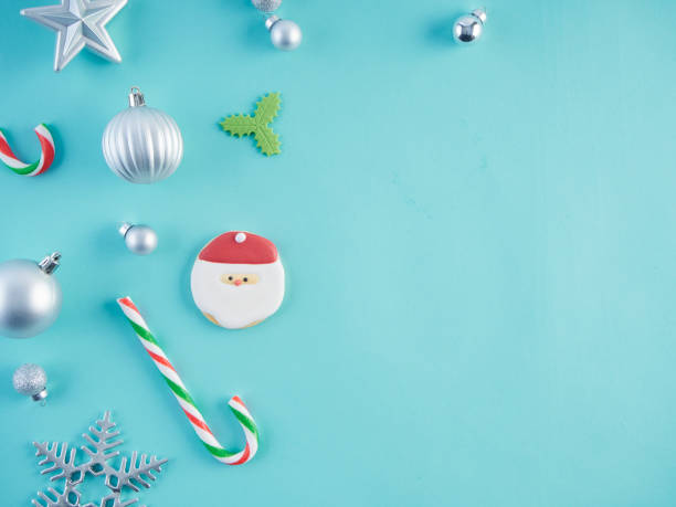 istock Christmas decorations against light blue background. Top view 1252835853